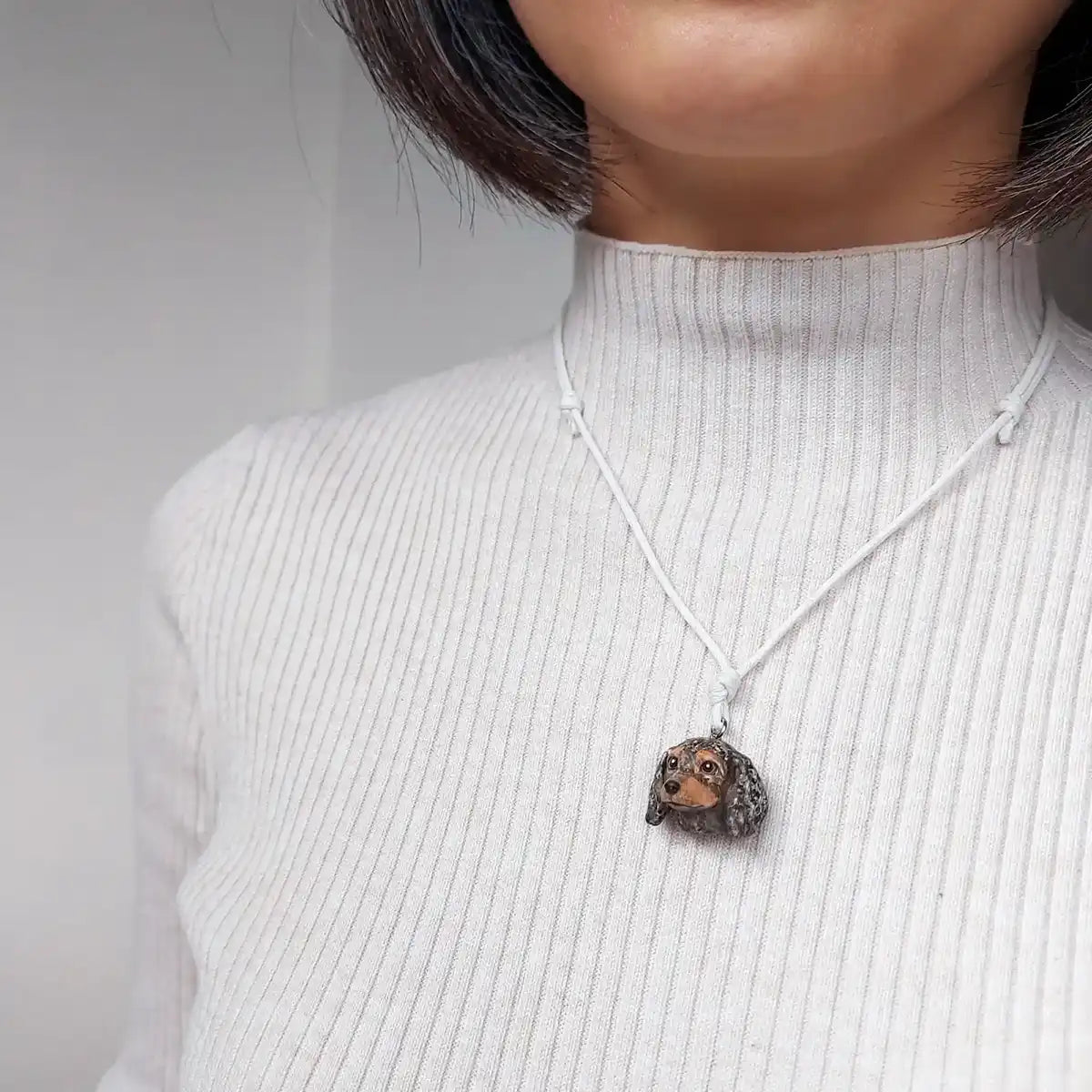 Hand-painted dapple dachshund sausage pendant necklace on adjustable cord
