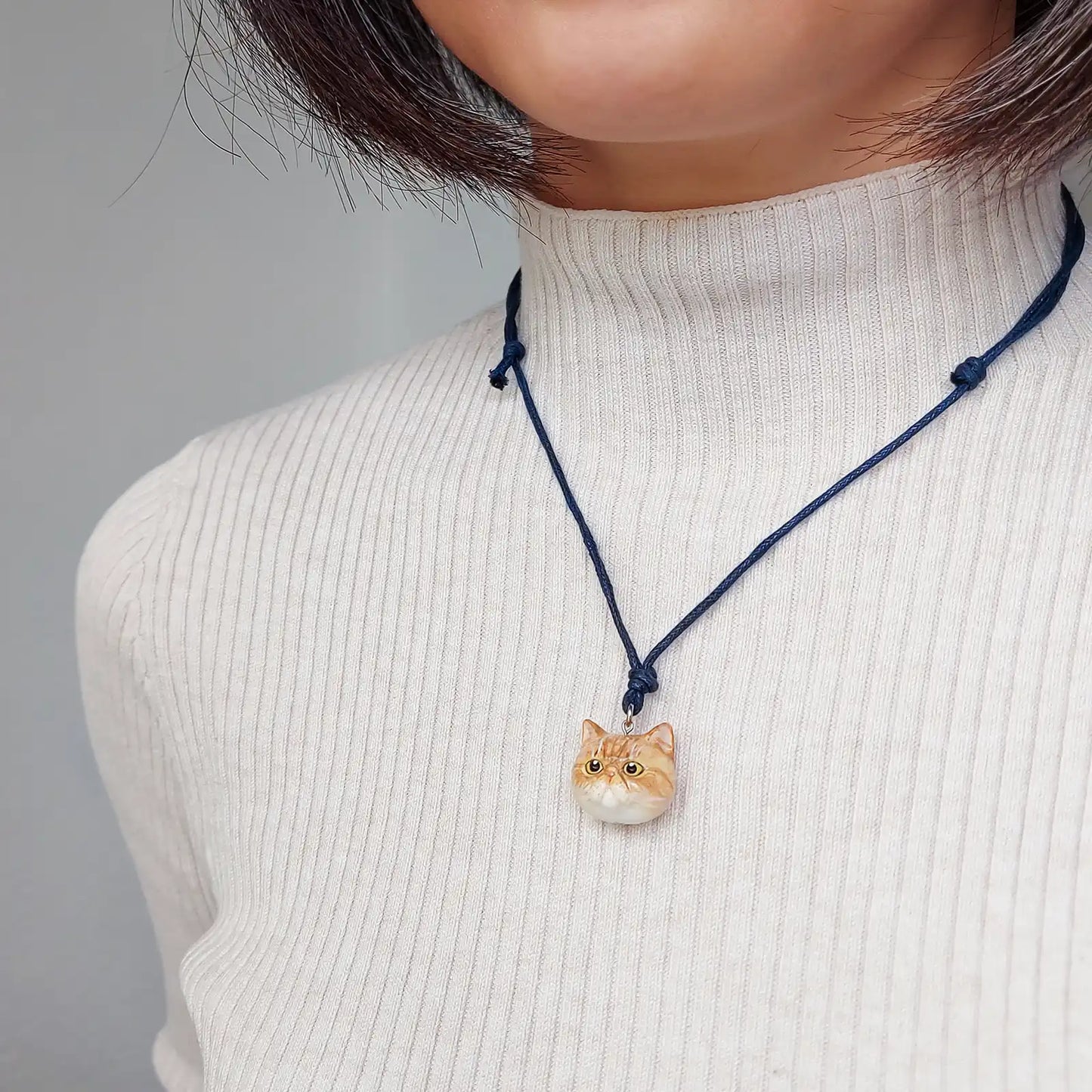 cat exotic shorthair ginger pendant wearing
