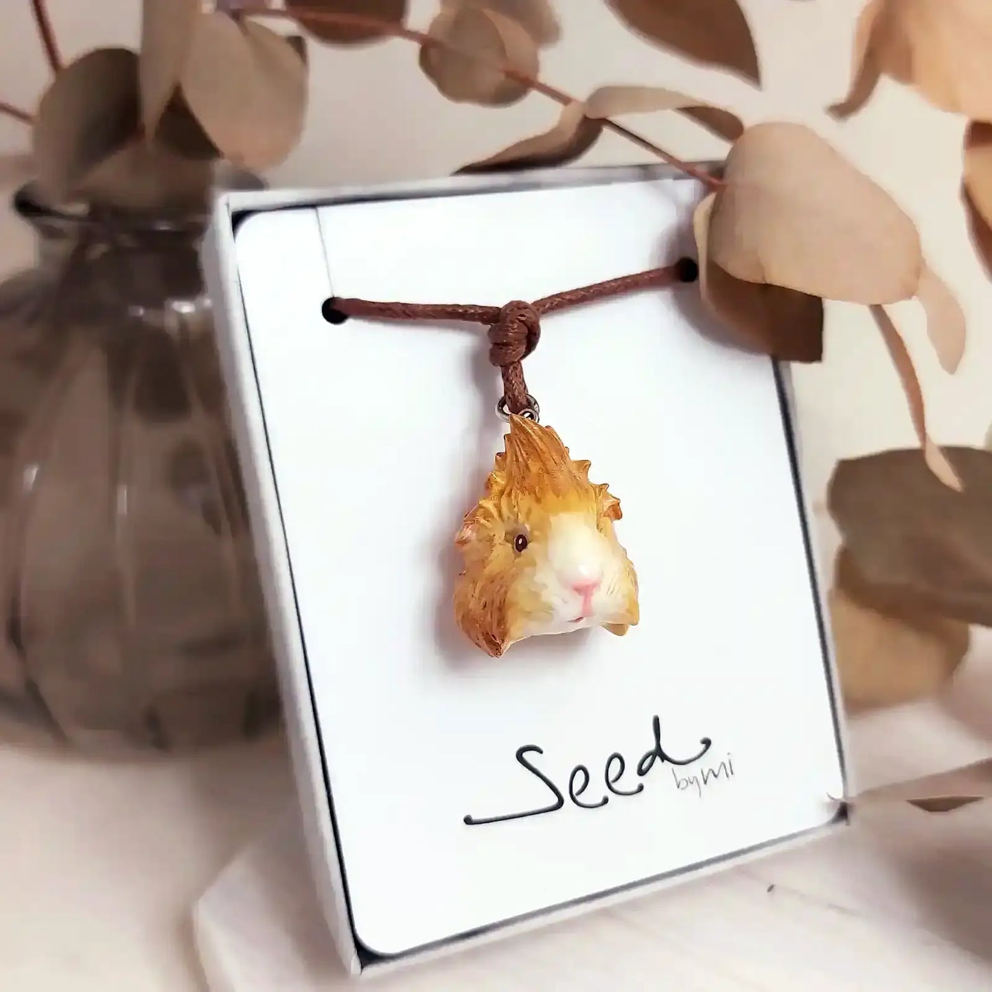 Buff & white Abyssinian guinea pig resin necklace, handcrafted and detailed