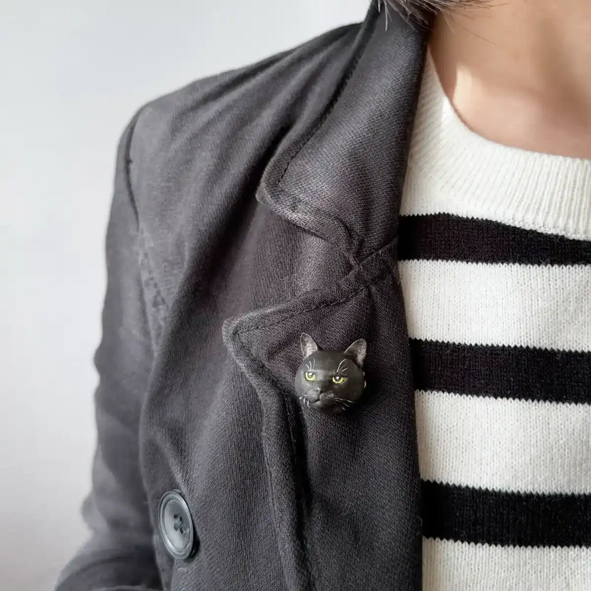 American Shorthair cat brooch with green eyes and grumpy expression