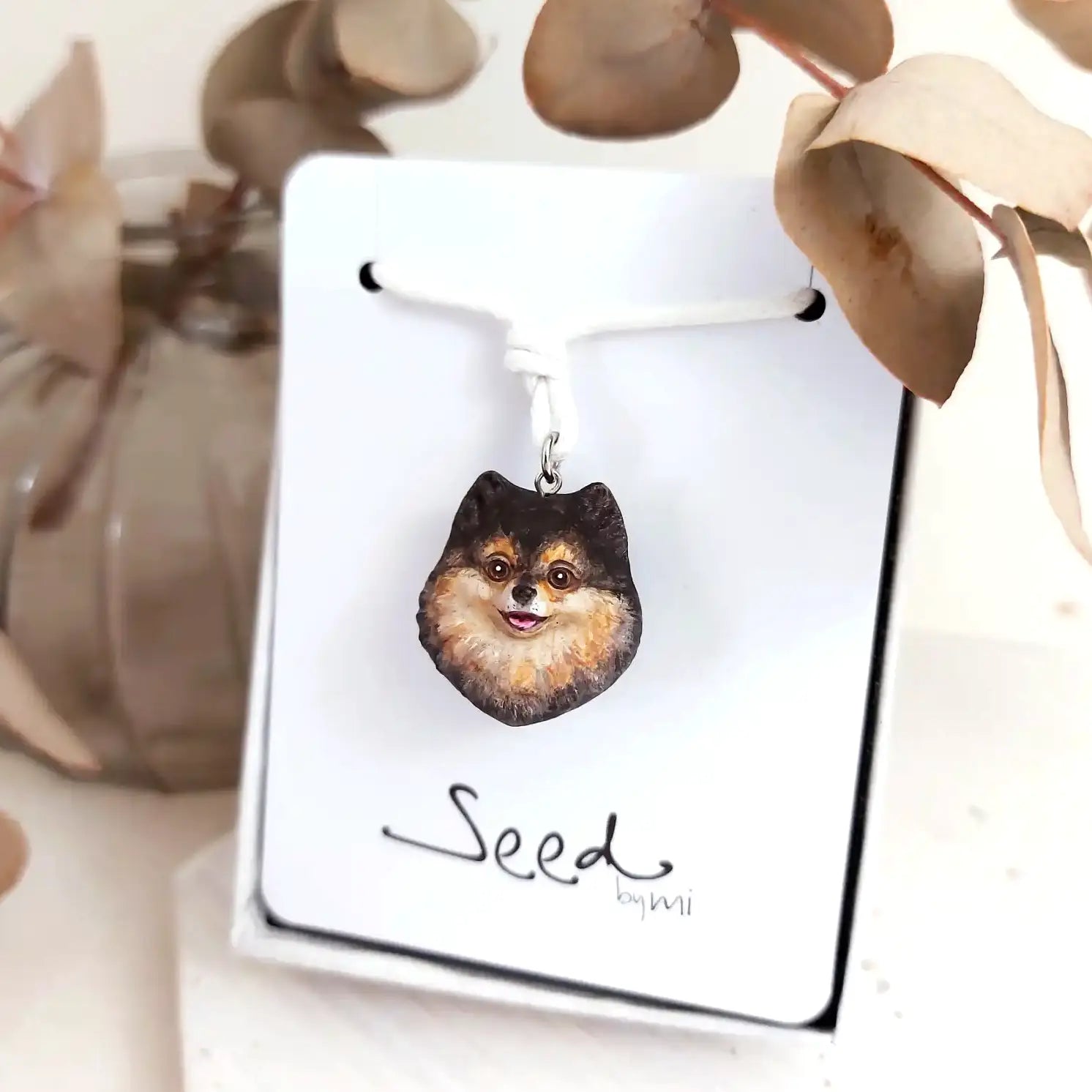 dog Pomeranian Black Tan pendant necklace package display