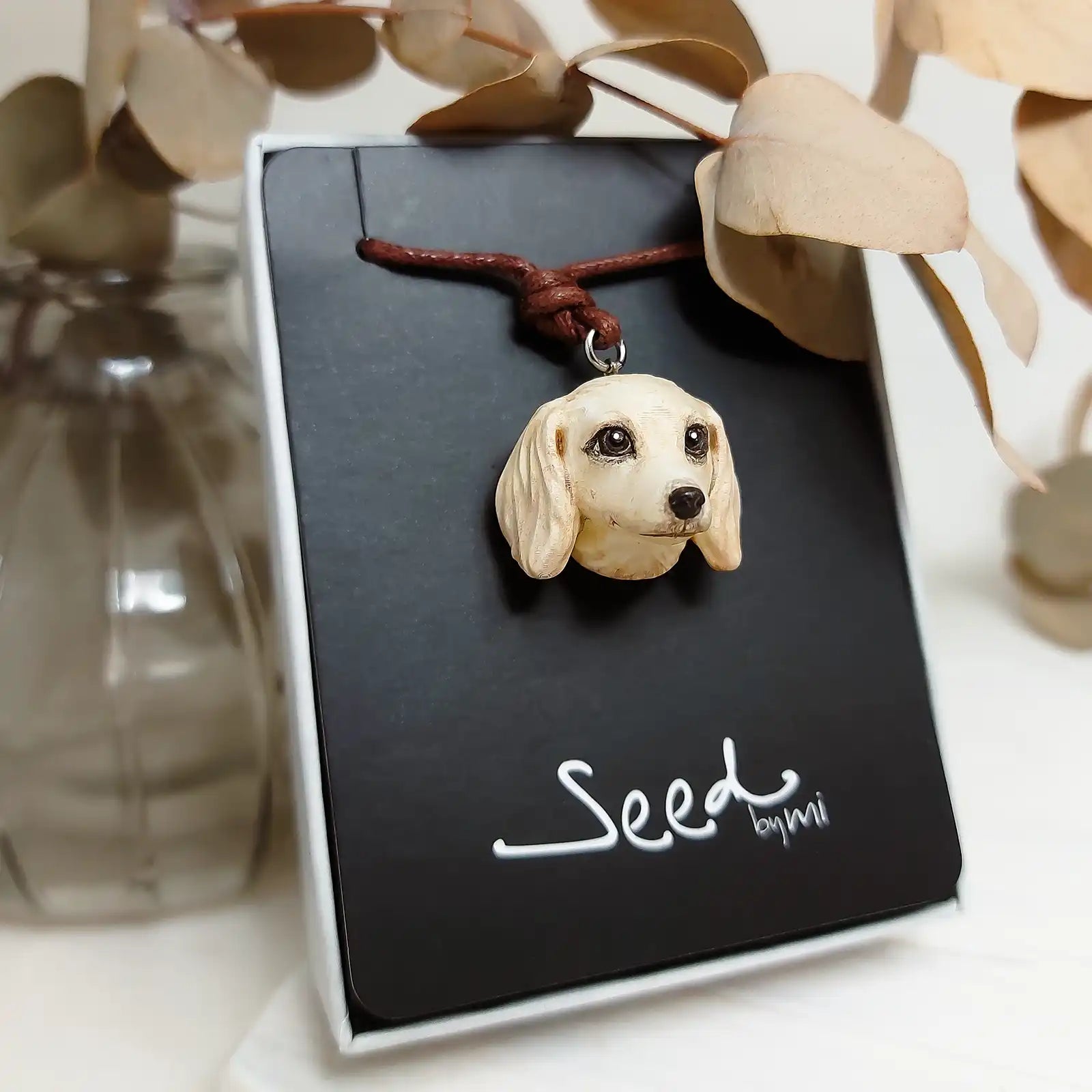 Cream Dachshund sausage pendant necklace with hand-painted resin finish