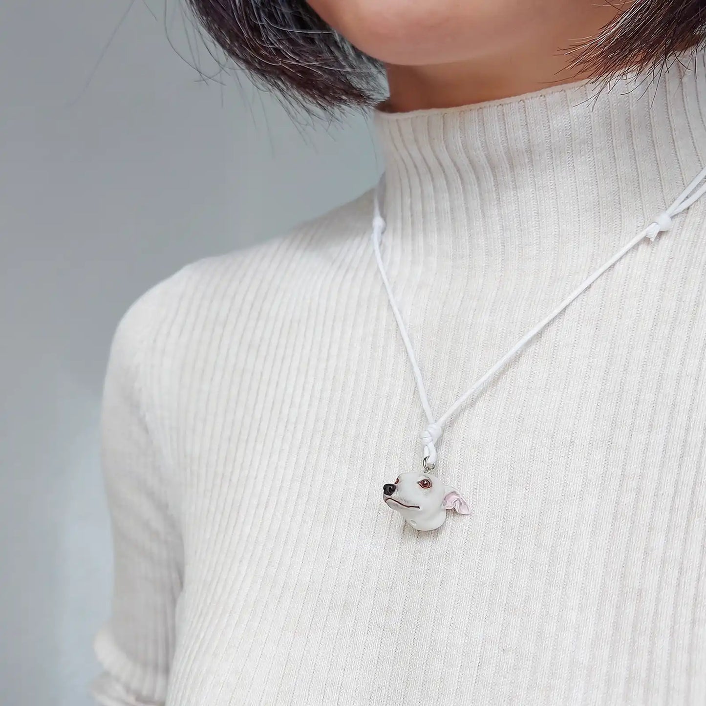 dog greyhound whippet white pendant wearing