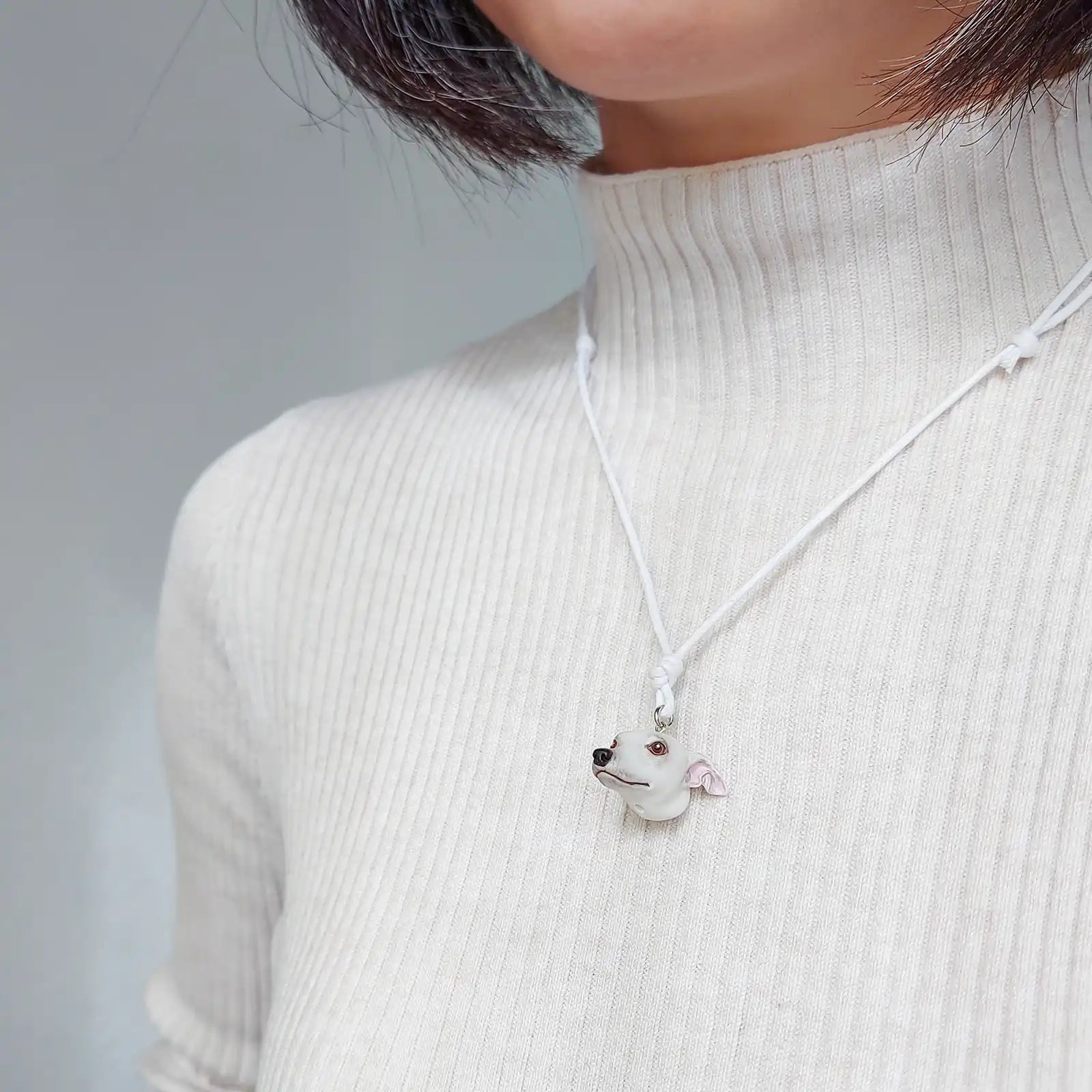dog greyhound whippet white pendant wearing
