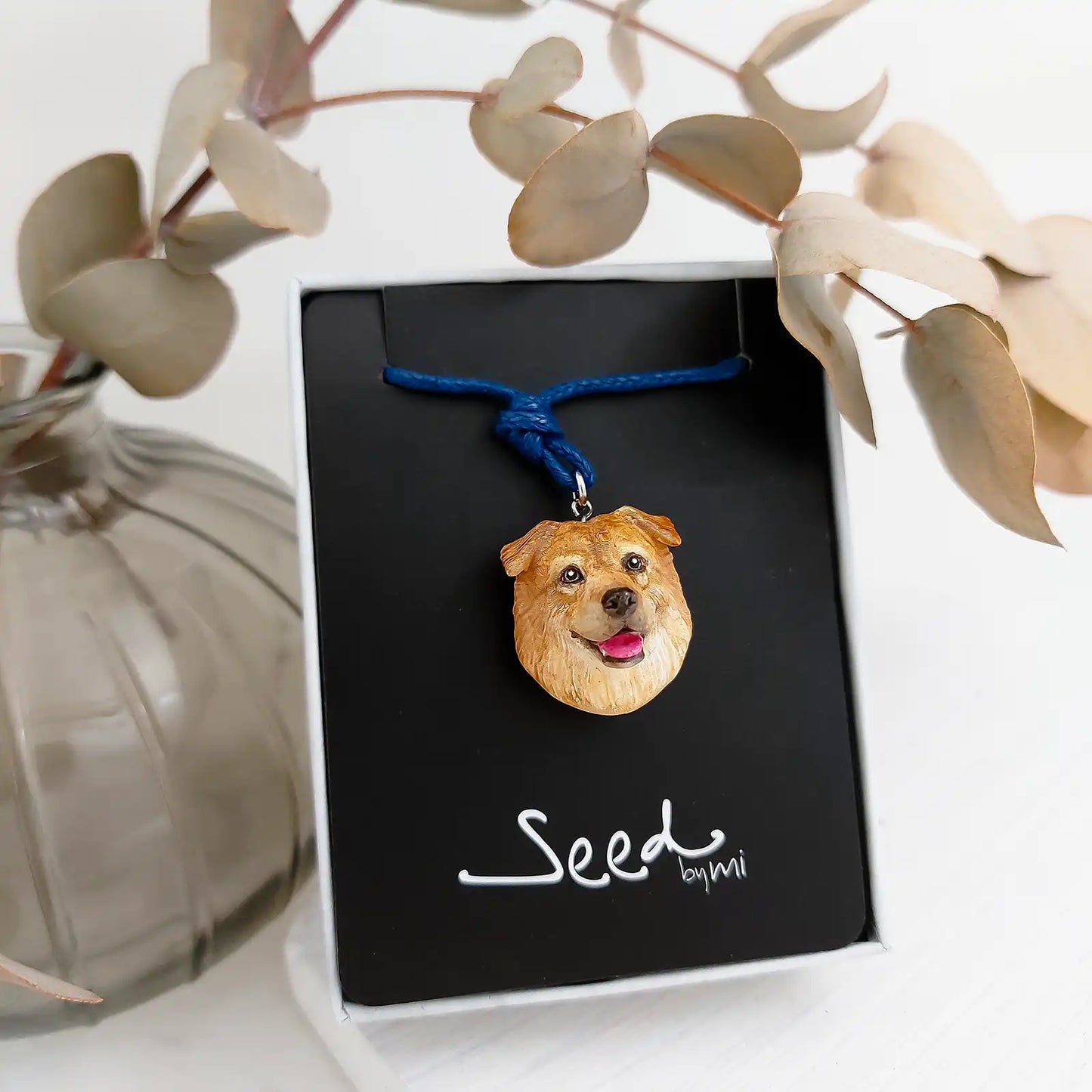 dog mongrel long hair drop ears tan pendant package display