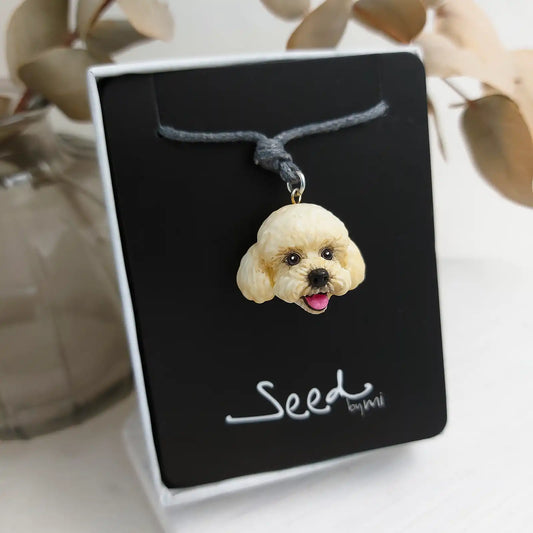 dog poodle cream pendant package display