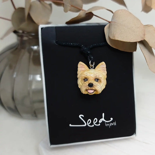 dog yorkshire terrier golden pendant package display