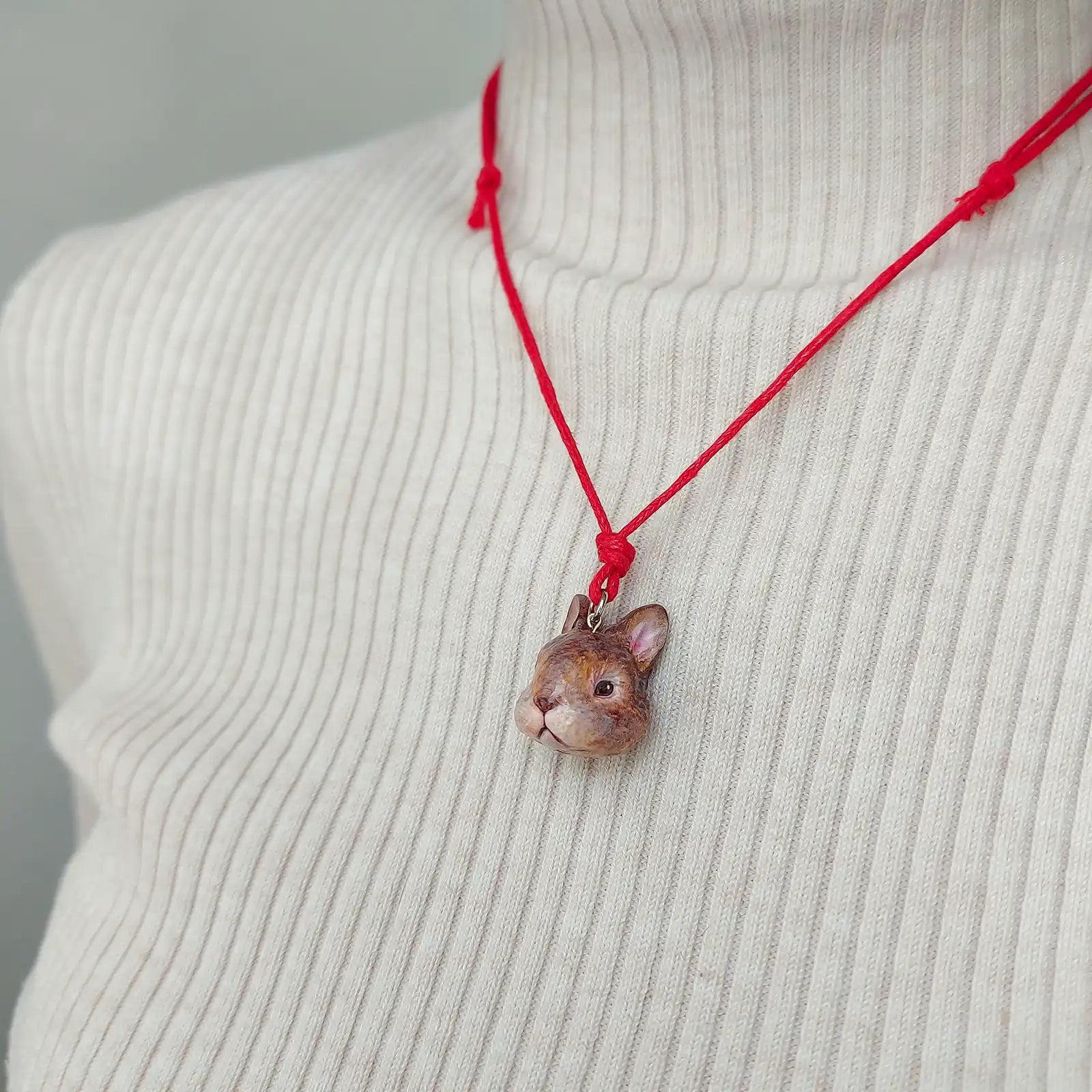 rabbit dwarf chocolate otter pendant wearing